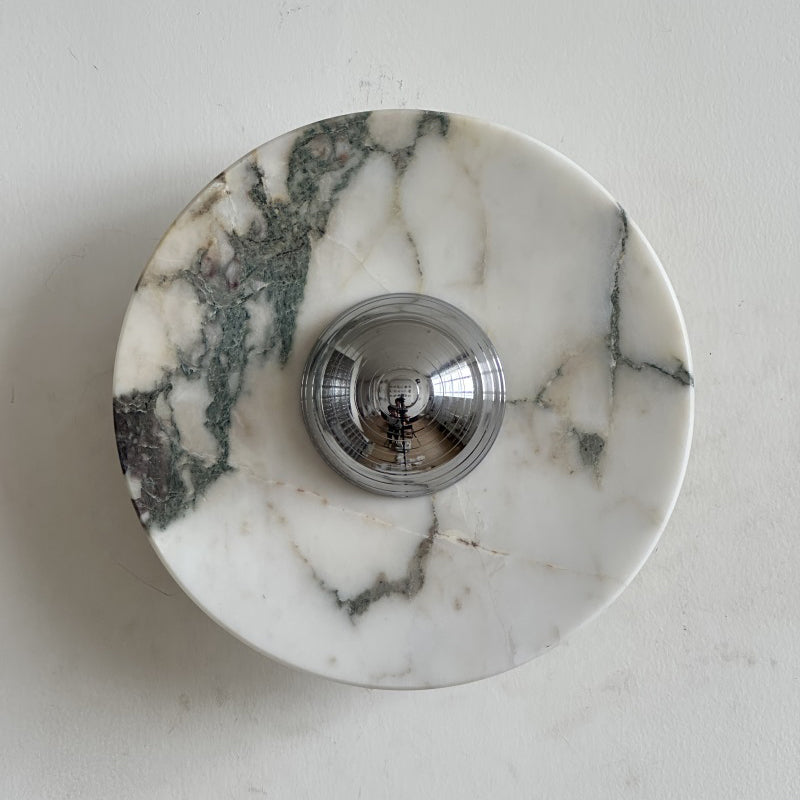 Amber, honey and cream stone with deep brown veins make up this Clérachic marble wall light, with a polished chrome dome at its centre.