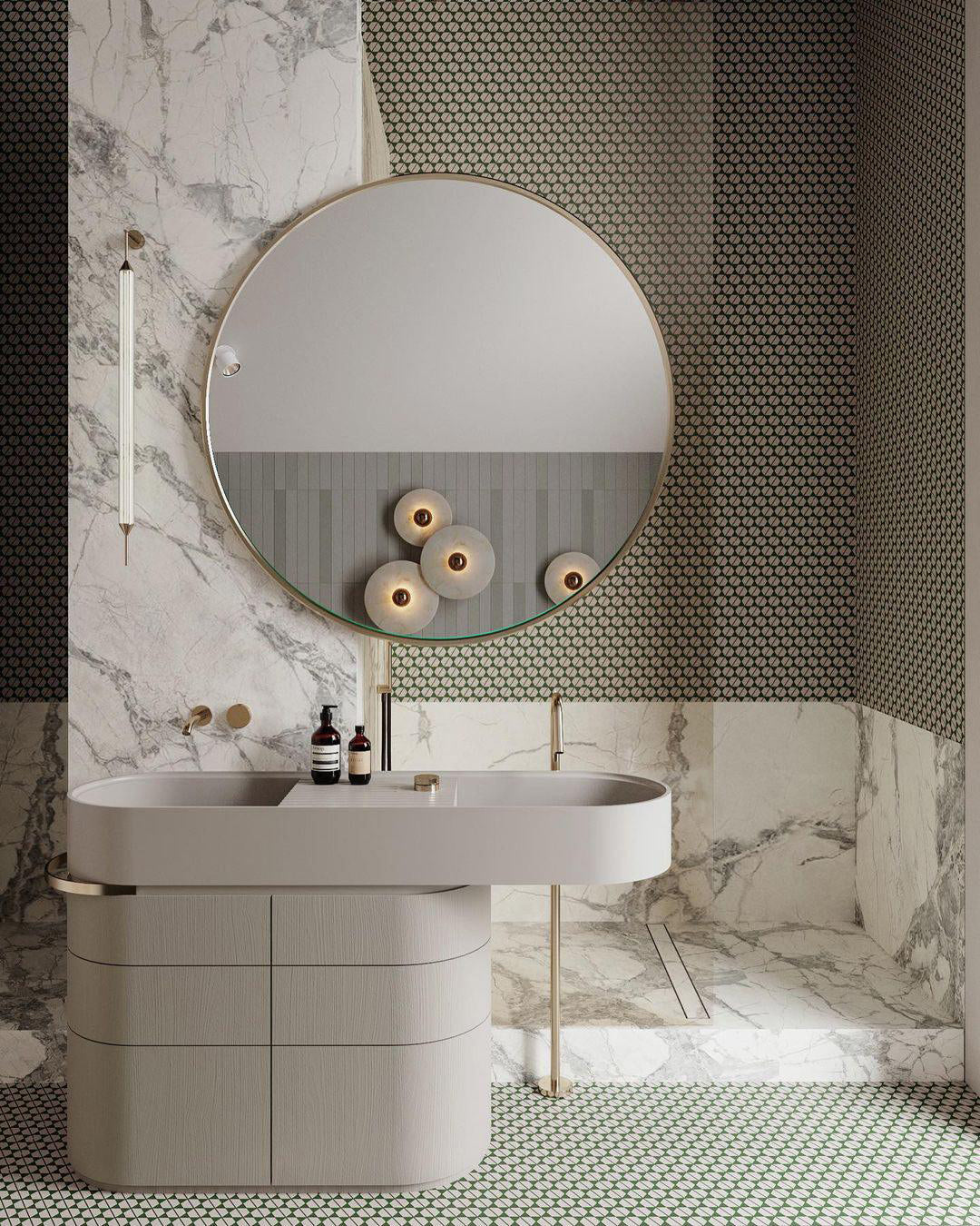Clérachic round alabaster sconces in a marble bathroom beside a round mirror and basin.