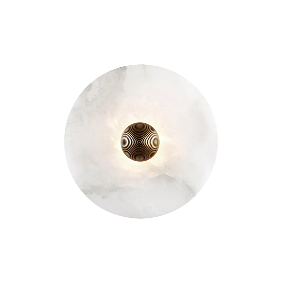 Clérachic round alabaster sconce lit on white, soft halo spreading out from the brass boss.