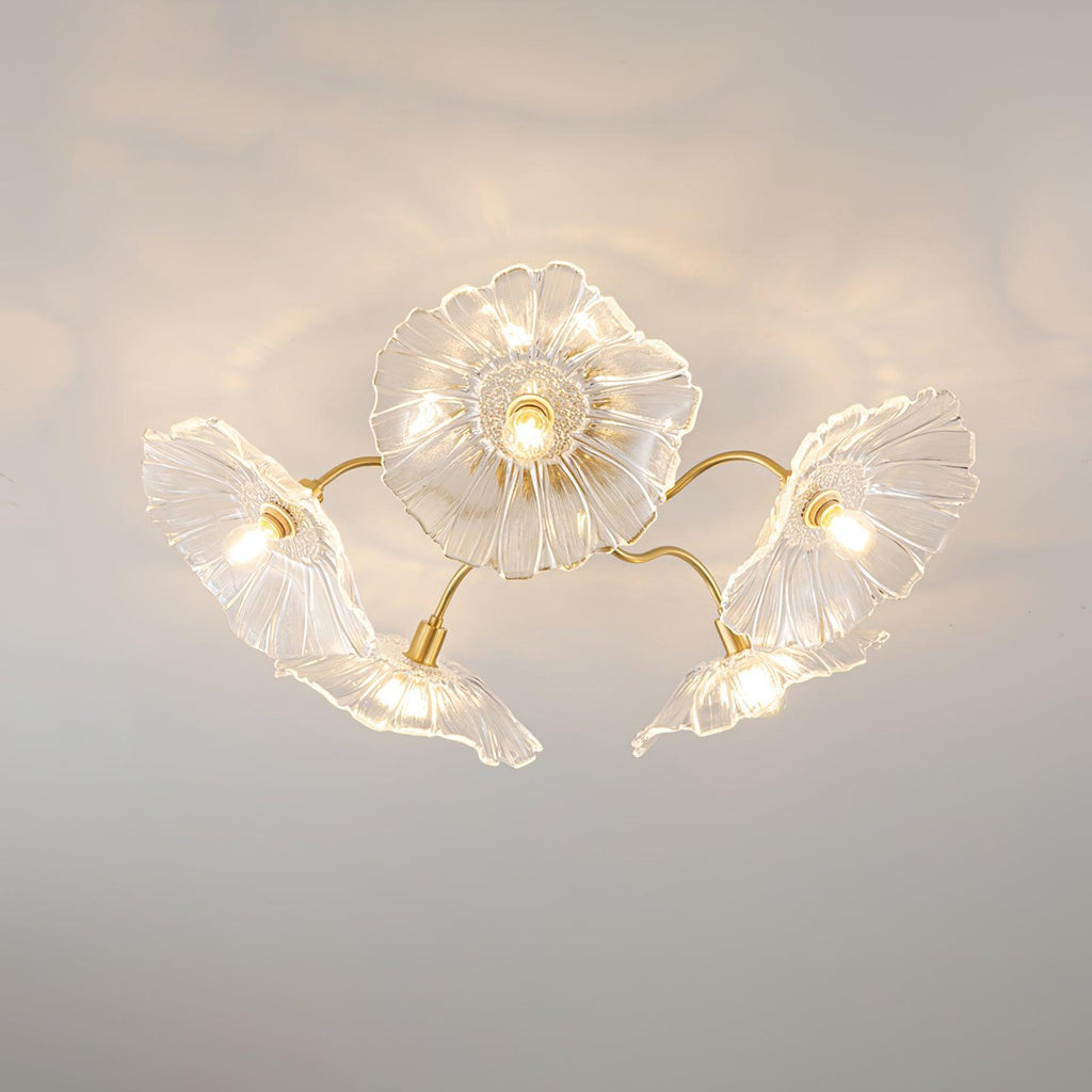Five clear glass ruffled flowers on brass gooseneck arms make up this Clérachic ceiling light, each shade lit from within.