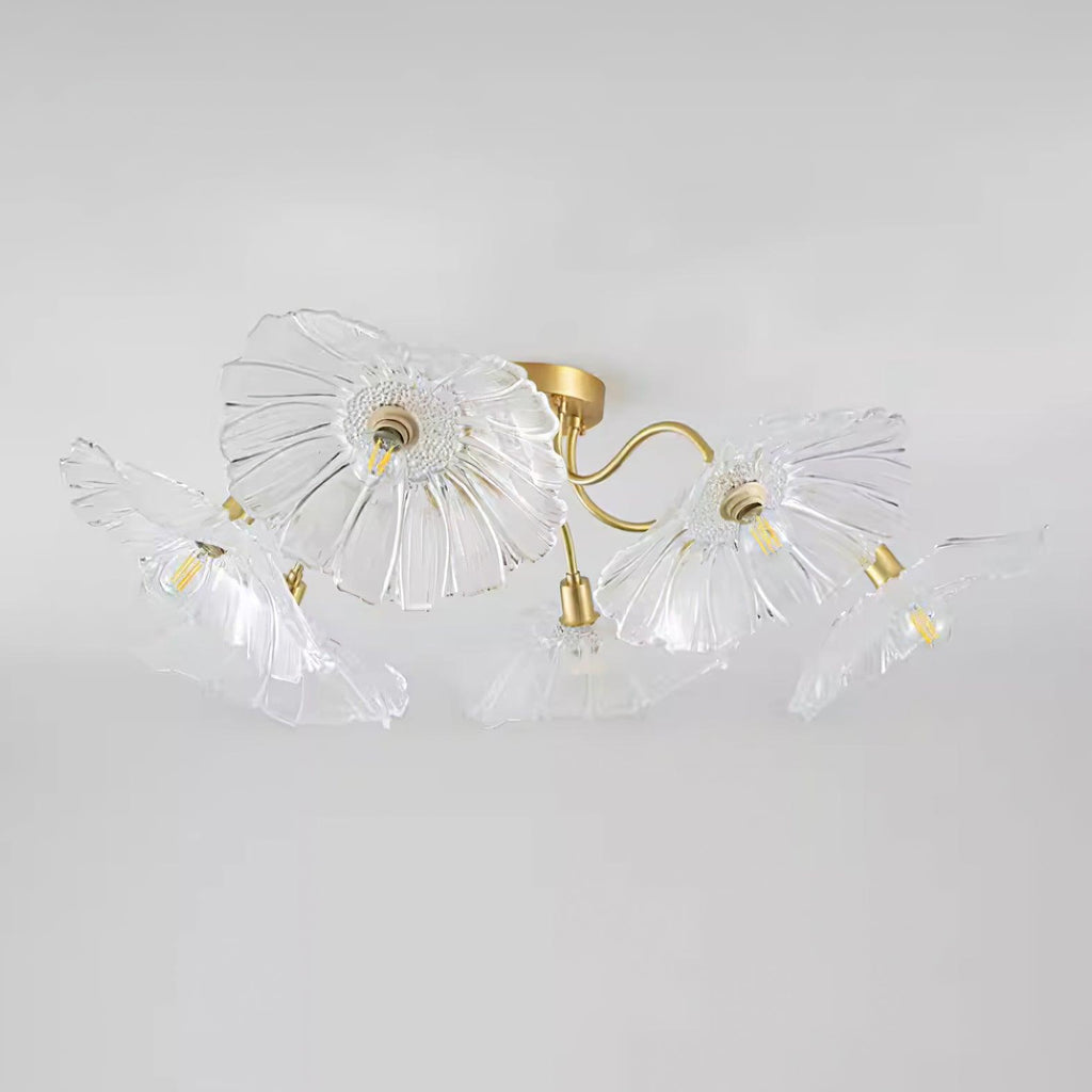 Studio shot of the Clérachic clear glass ceiling light, its ruffled shades spread wide against a grey backdrop.
