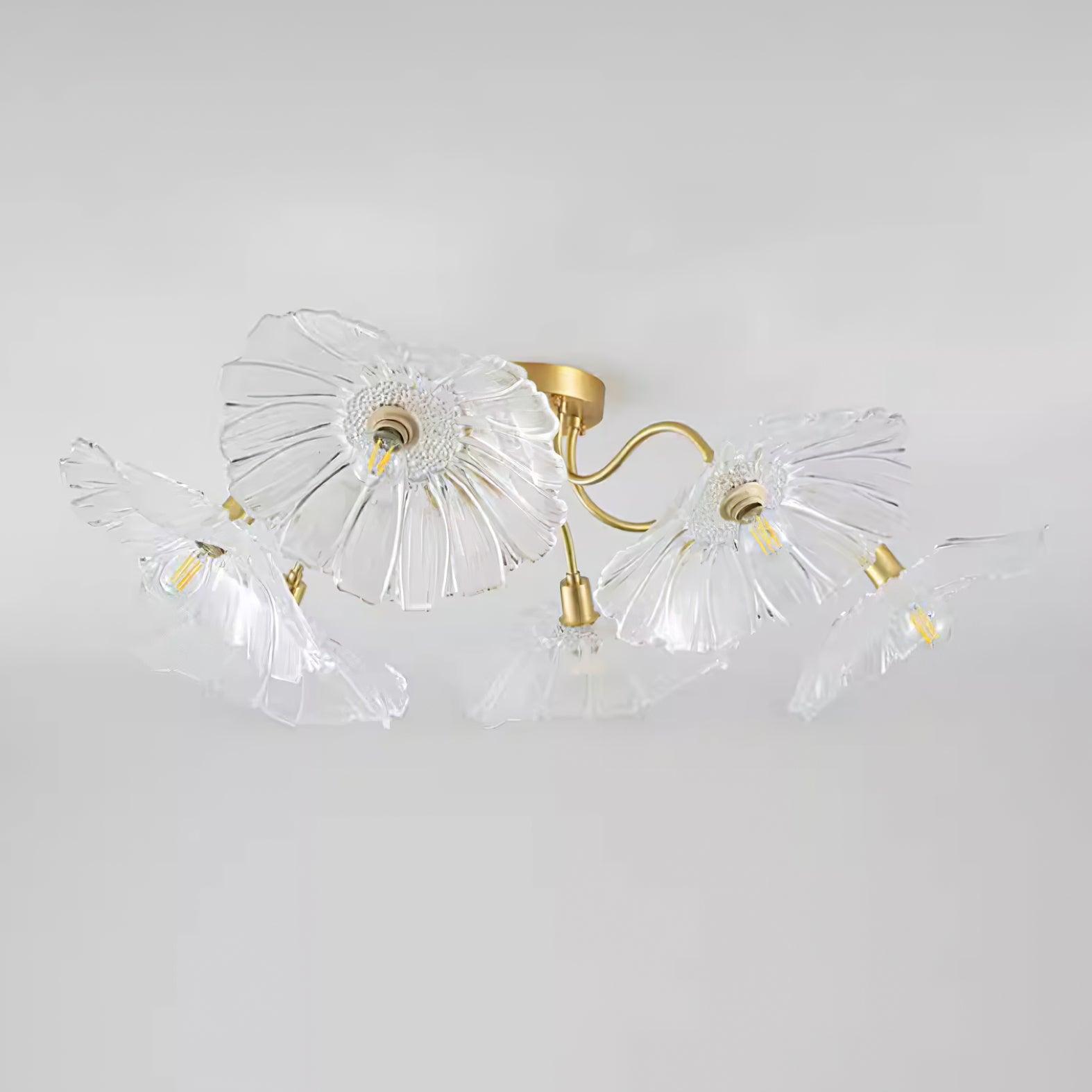 Studio shot of the Clérachic clear glass ceiling light, its ruffled shades spread wide against a grey backdrop.