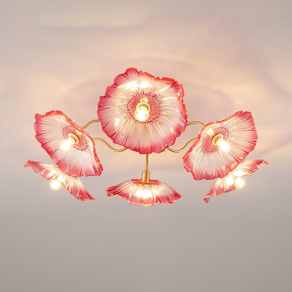 Studio shot of the Clérachic pink glass ceiling light, its ruffled shades catching light against a pale backdrop.