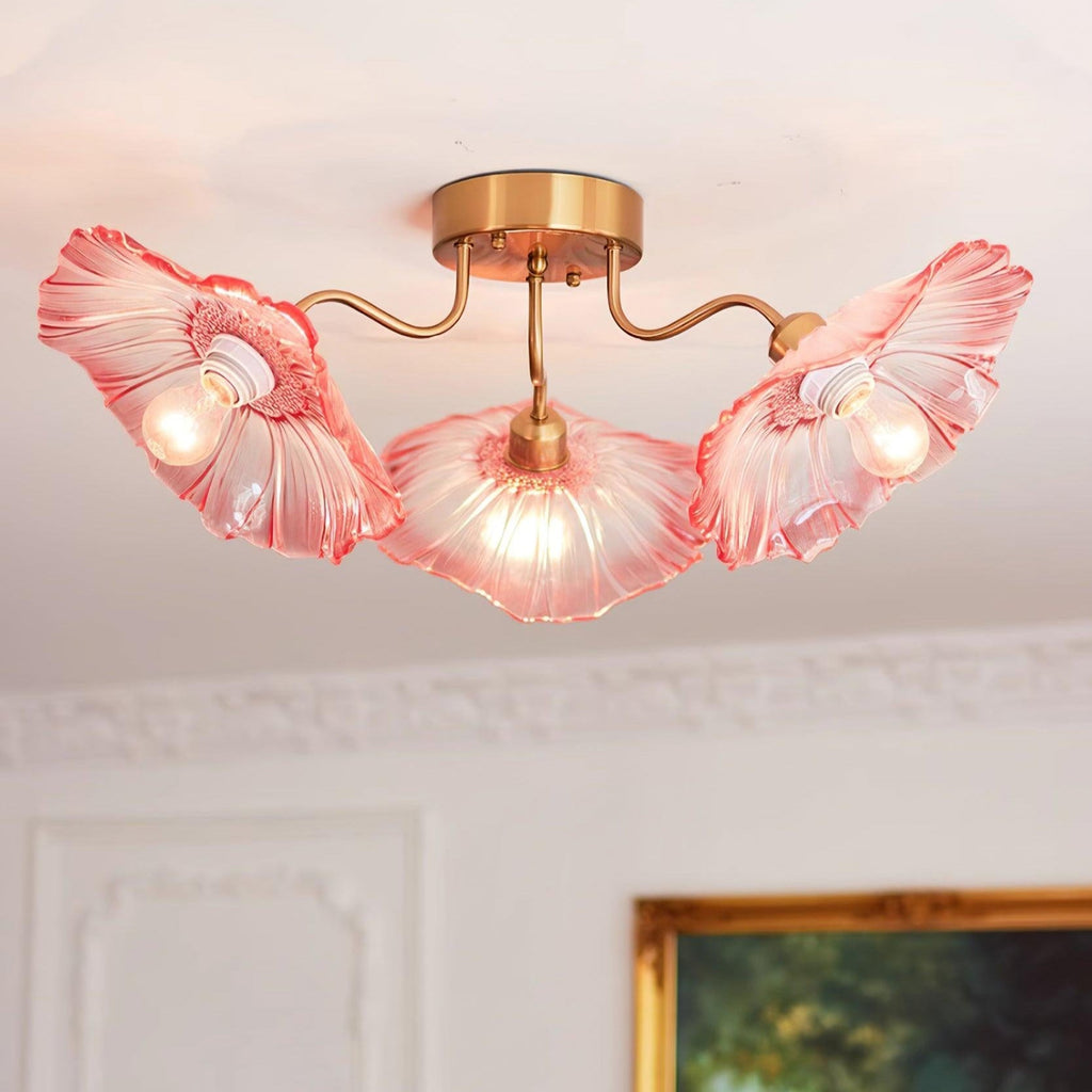 The same corner in pink: Clérachic's ruffled glass ceiling light under crown moulding beside a gilt-framed painting.