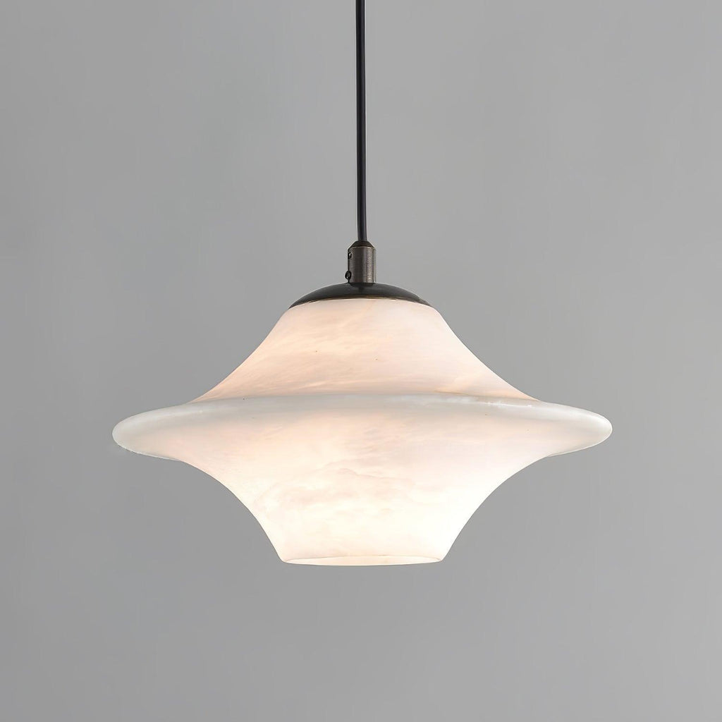 Clérachic saucer pendant, a wide low-profile alabaster shade on a black cord against grey.