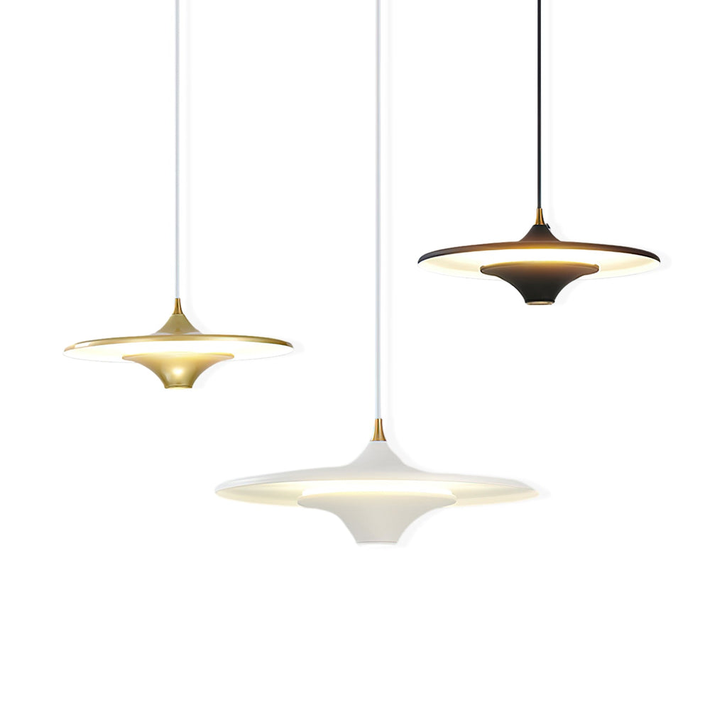Gold, black and white Clérachic saucer pendants shown together at different heights on a plain white background.