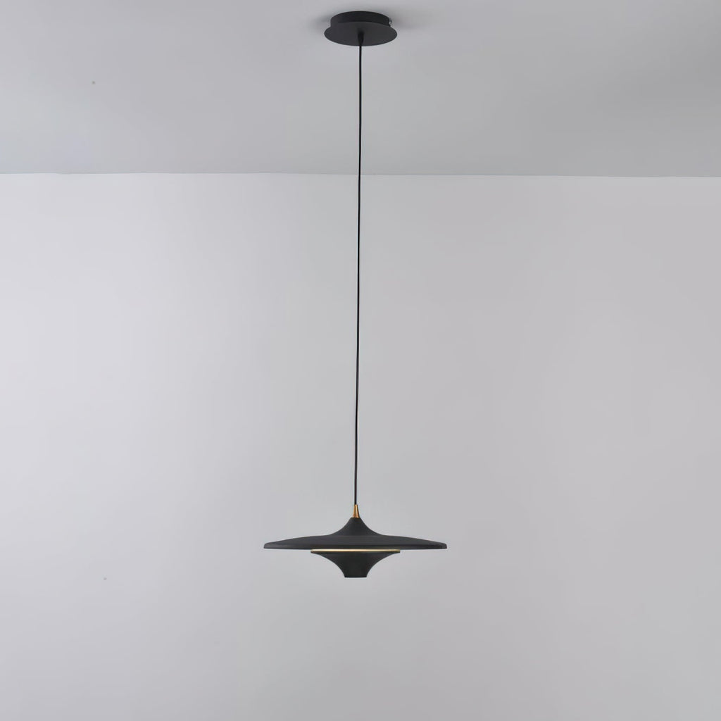 Full-length view of a black Clérachic saucer pendant on its slim black cord from a matching black ceiling canopy.