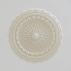 Straight-on underside of the white Clérachic scalloped glass dome pendant light, showing the pressed bead-and-ray rosette