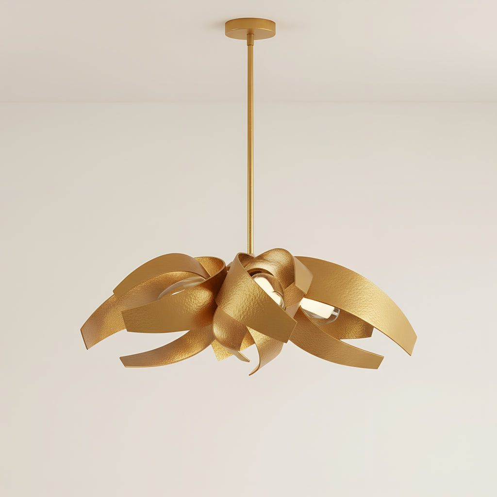 The same chandelier in the gold finish, every steel ribbon brushed gold inside and out, hanging from a single slim rod and round canopy