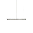 Short clear glass linear chandelier from Clérachic on three thin cables, shown unlit on a white backdrop.