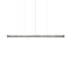 Product shot of a Clérachic linear chandelier with six glass sections hung on three fine cables, on a white backdrop.