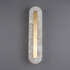 Clérachic Selvia wall light unlit on grey, natural veining visible across the stone.