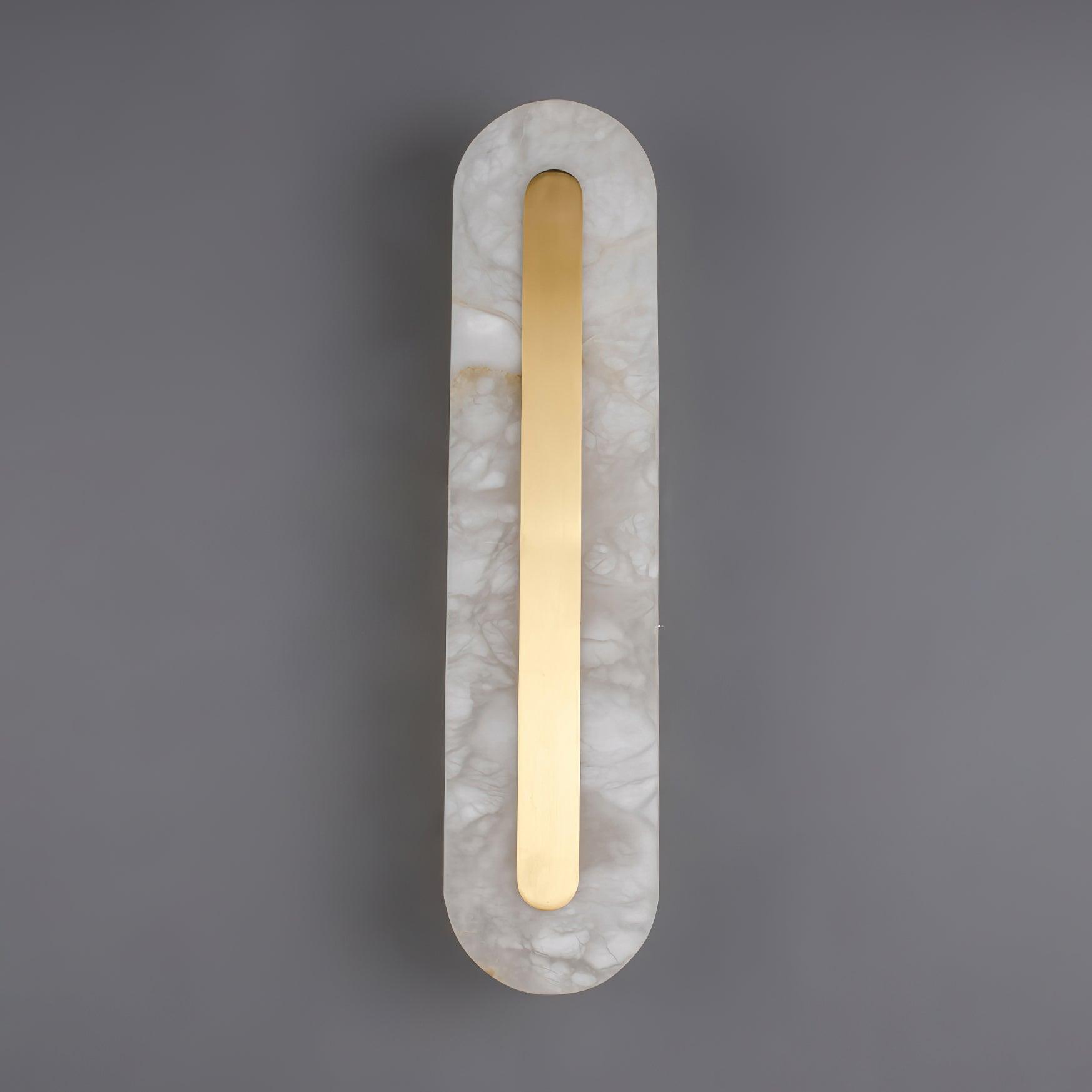Clérachic Selvia wall light unlit on grey, natural veining visible across the stone.