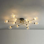 The twelve-light Clérachic sputnik chandelier fills the ceiling, transparent globes and gold mesh sleeves casting a woven pattern.