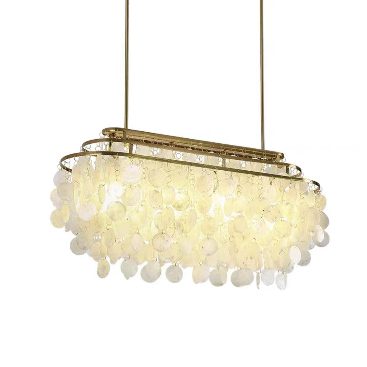 Long oval Clérachic shell chandelier on two gold rods, lit warm, with its discs hanging below the oval frame.