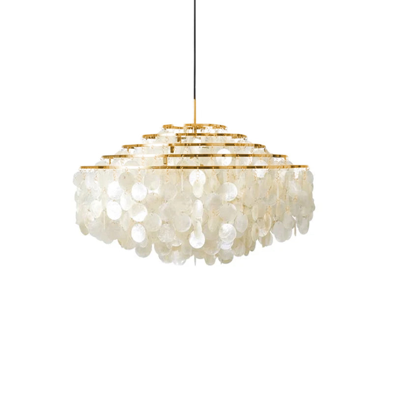Wide gold-ringed Clérachic shell chandelier on white, with a flat, squared spread of white discs below stepped rings.
