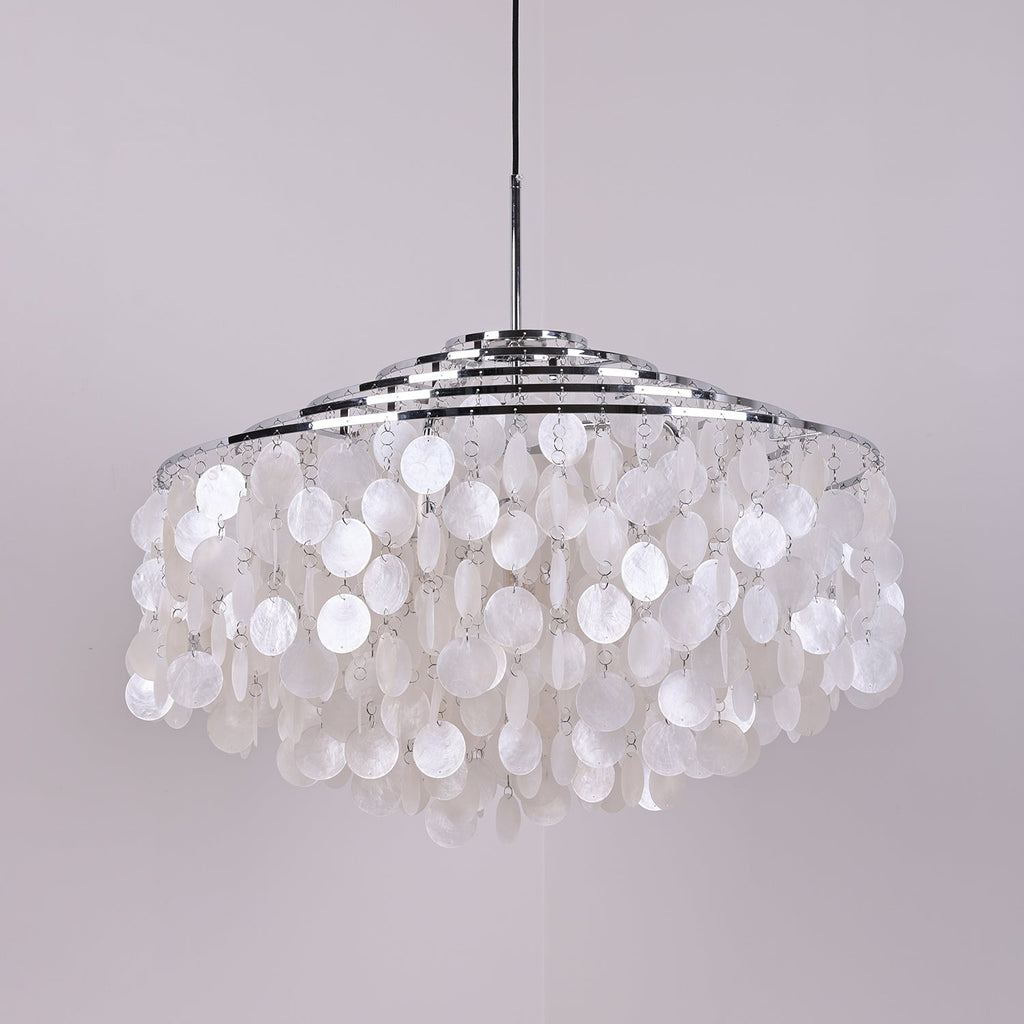 Wide chrome-ringed Clérachic shell chandelier, unlit, with full rows of white discs, hung from a slim chrome stem.
