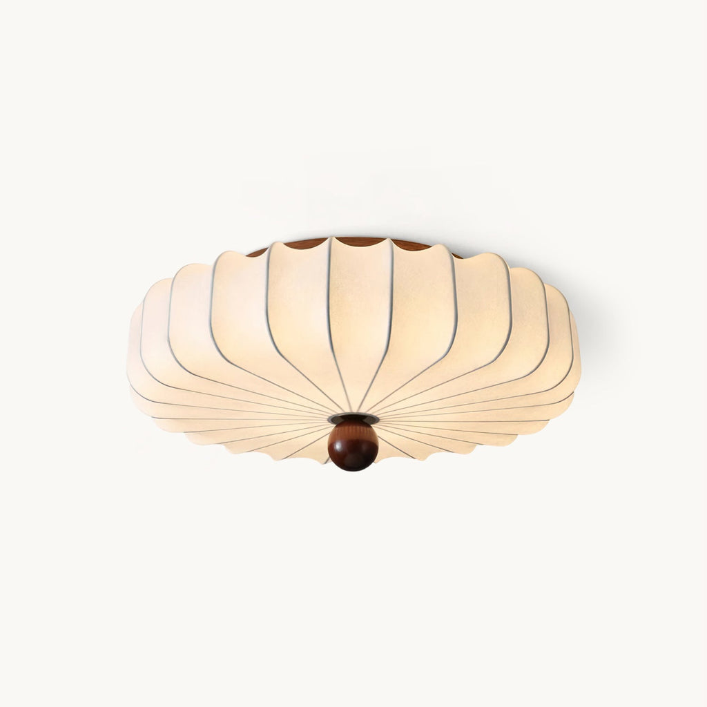 Cut-out view of a Clérachic flush-mount ceiling light with a white pleated silk-look shade and a round walnut-colour finial, on white.