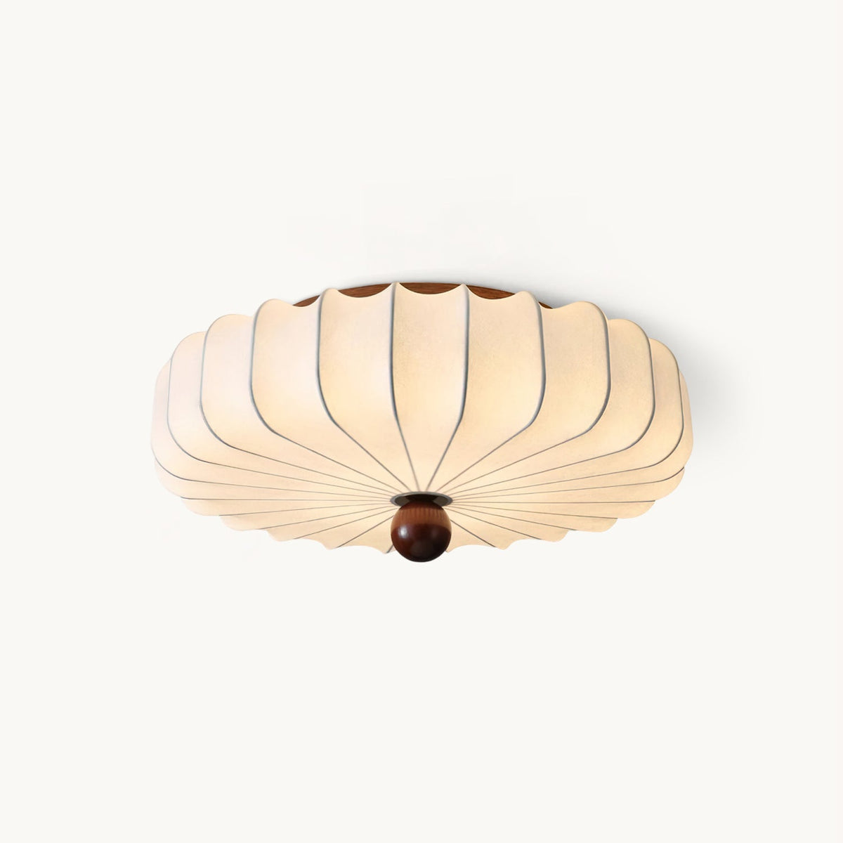 Cut-out view of a Clérachic flush-mount ceiling light with a white pleated silk-look shade and a round walnut-colour finial, on white.