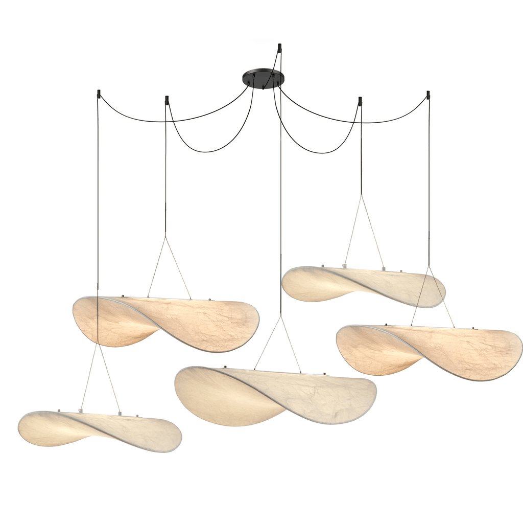 Five twisted white pendants in several sizes hang from looped black cables on one black ceiling canopy, a Clérachic cluster.