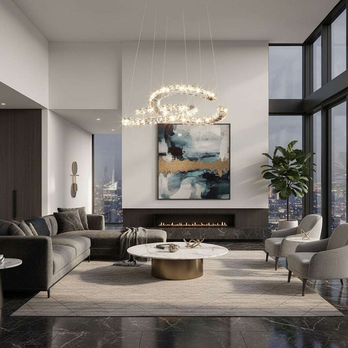 Clérachic crescent pendant with sparkling crystals hangs in a double-height living room with a charcoal sofa and a large abstract painting.