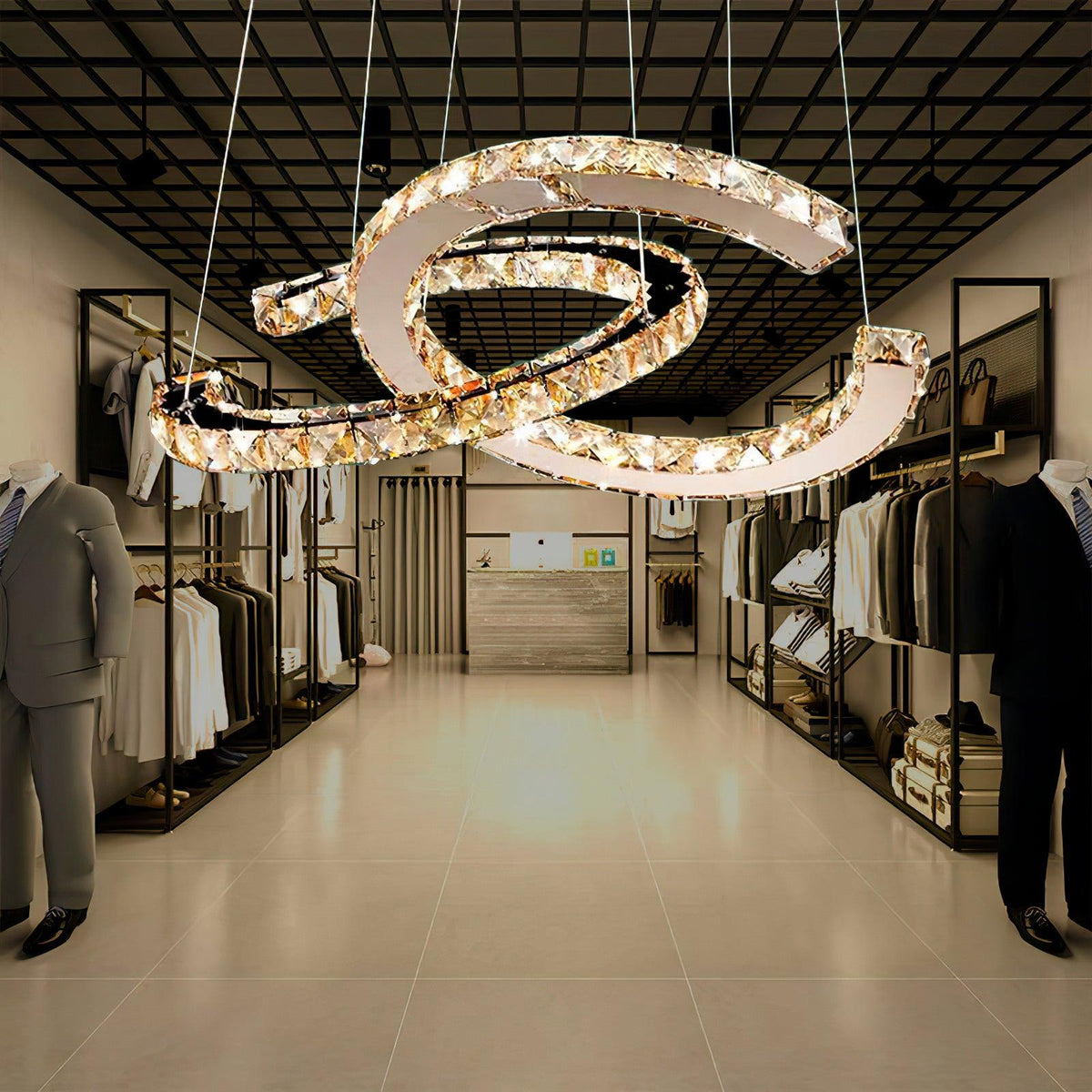 Cognac-toned Clérachic pendant hanging in a clothing boutique, with rails of garments and a tiled floor below.