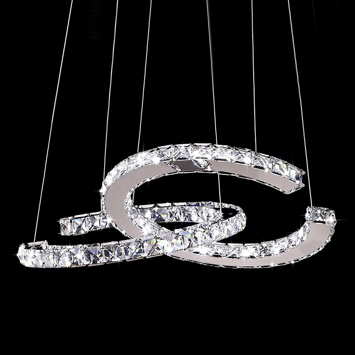Clear-crystal Clérachic pendant lit on black, with six fine cables holding the two crescents.