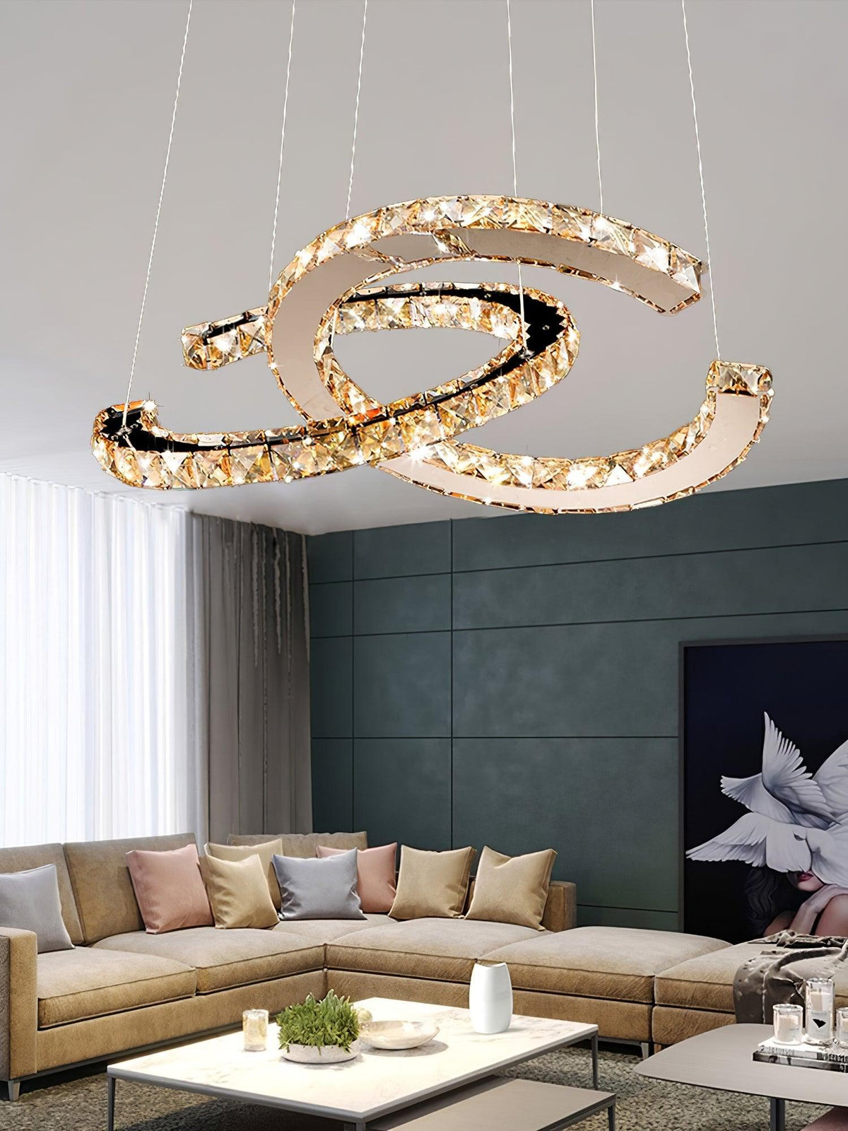 Cognac-toned Clérachic pendant above a living room with a tan corner sofa, a white coffee table and a dark green wall.