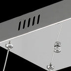 Close view of the steel ceiling plate of this Clérachic pendant, with its vent slots and cable grippers.