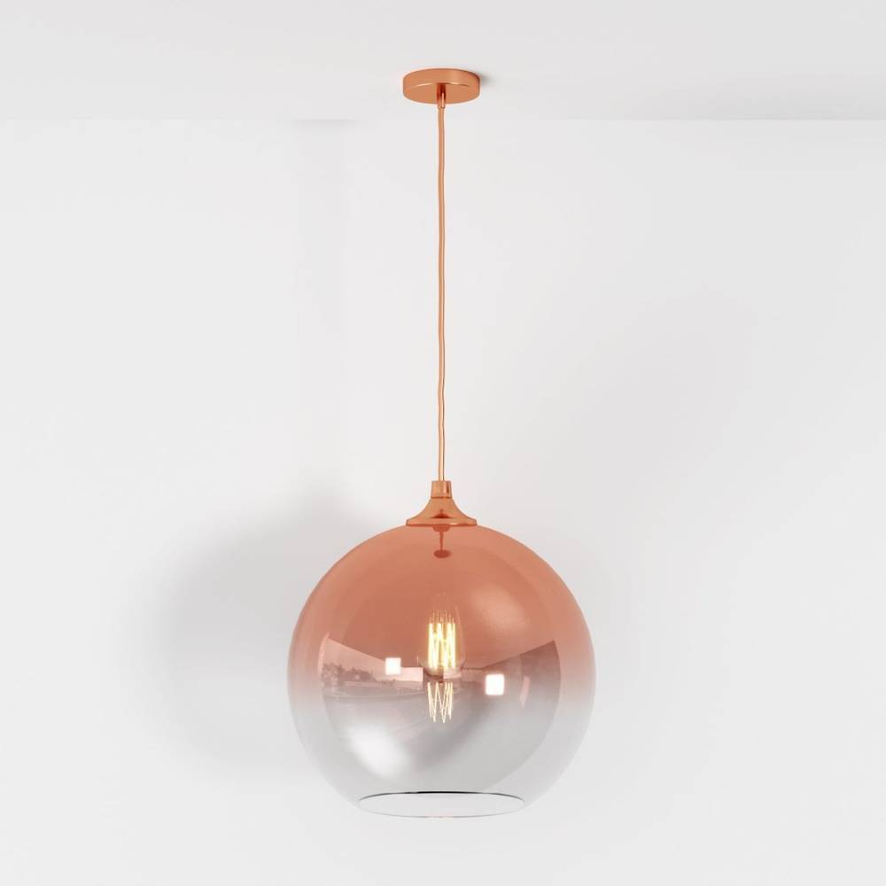 Clérachic rose gold glass sphere pendant hangs at full length, gradient glass glowing warm on white backdrop.