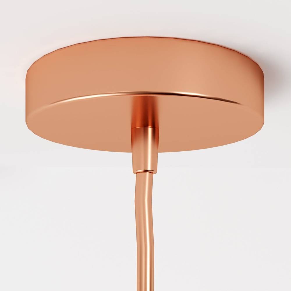 Clérachic close-up of the rose gold ceiling canopy and cord fitting, shown against a plain white backdrop.