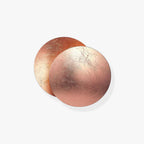 Two overlapping rose-copper discs of this Clérachic wall light on a plain white backdrop, the front disc shown crackled and slightly pink.
