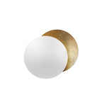 White front disc over a gold-leaf disc on this Clérachic wall light, with the gold peeking out behind, on white.