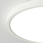 Close view of the white rim and the edge of the glowing acrylic diffuser on this Clérachic ceiling light.