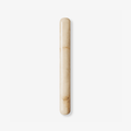 Slim Clérachic wall light in white alabaster with soft honey veining, a rounded-end cylinder shown on a plain white backdrop.