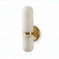 Clérachic alabaster wall light in a brass and white finish, seen from the side on a plain white background.