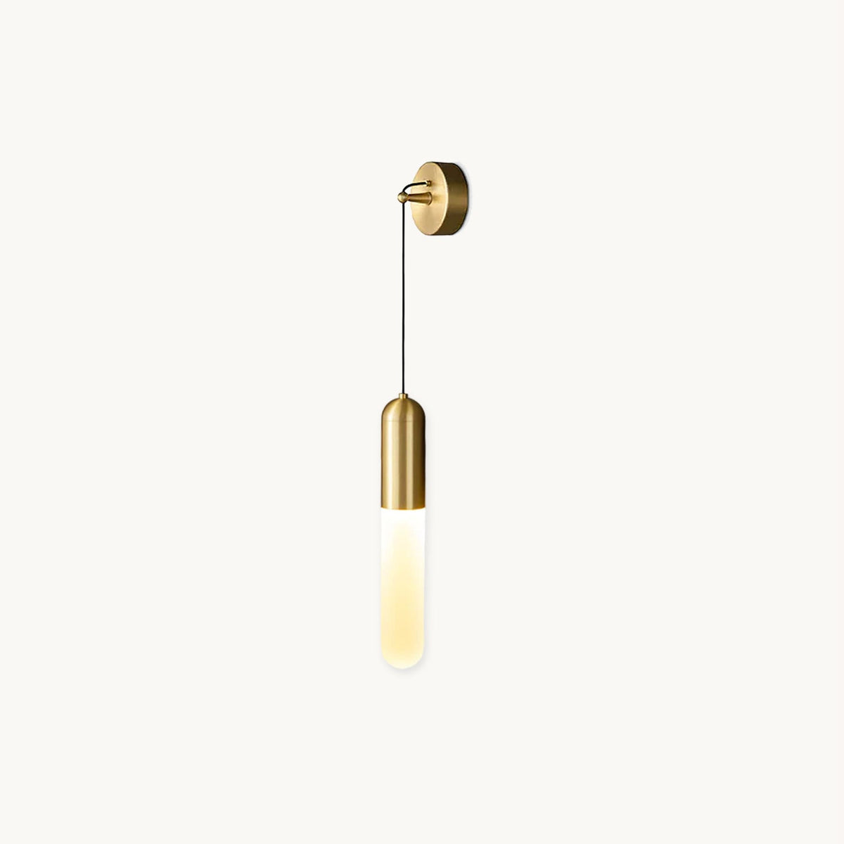 Brass Clérachic wall light on a plain white backdrop, a slim opaque cylinder shade hanging on a thin black cord from a round wall plate.