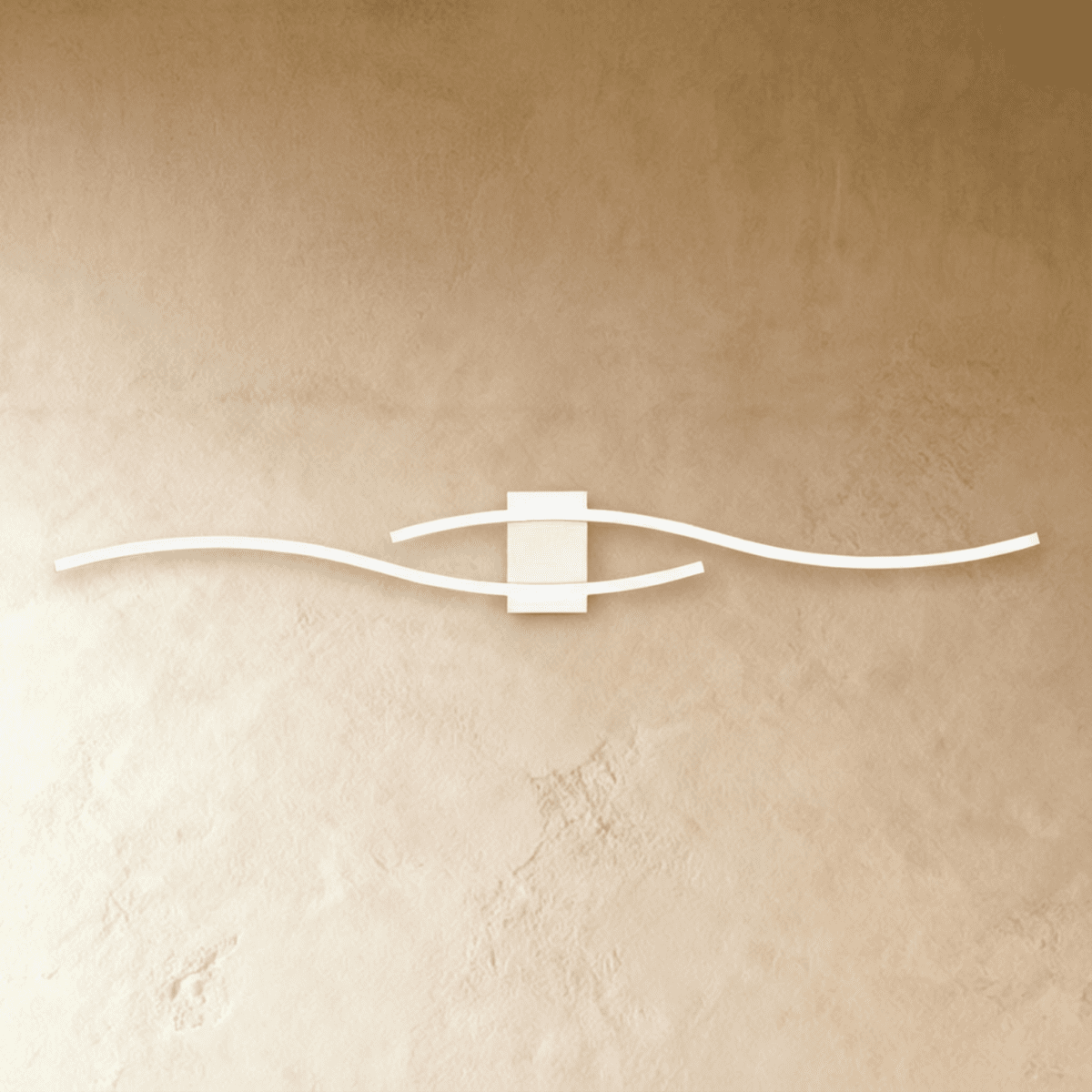 Clérachic slim white LED wall lamp with two wavy bars crossing on a square backplate, mounted on a warm limewashed wall.