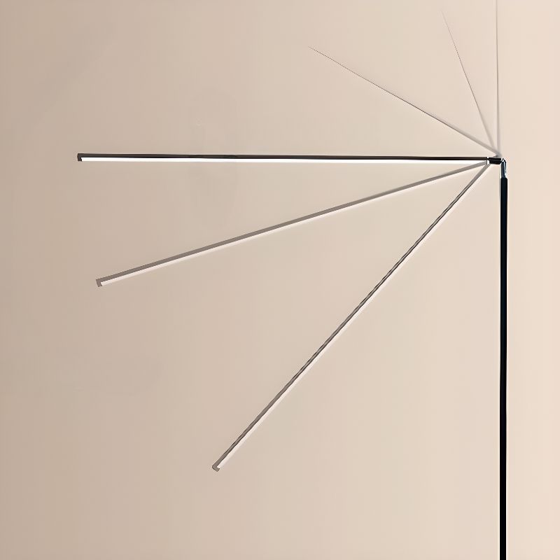 The black light bar of this Clérachic floor lamp is shown in a fan of angles, from horizontal to steeply raised, against a cream wall.