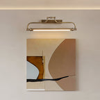 Close-in view of this Clérachic wall light shining down over a large abstract painting in warm earth tones.