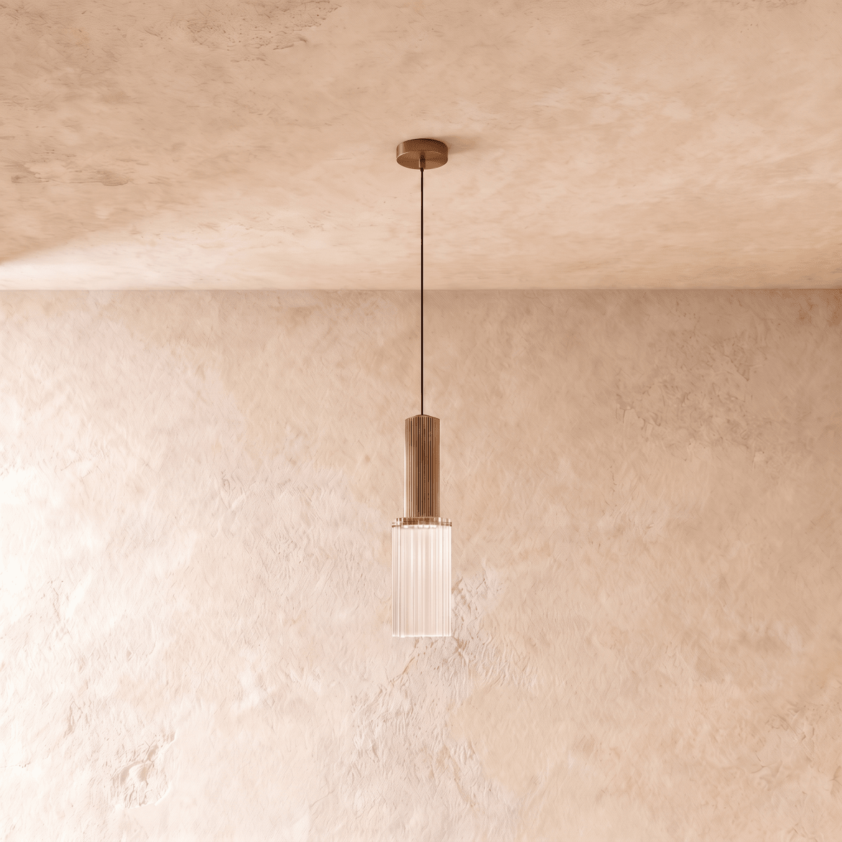 Clérachic slim pendant with a fluted brass-toned body and a ribbed clear glass shade on a thin cord, 30 cm tall