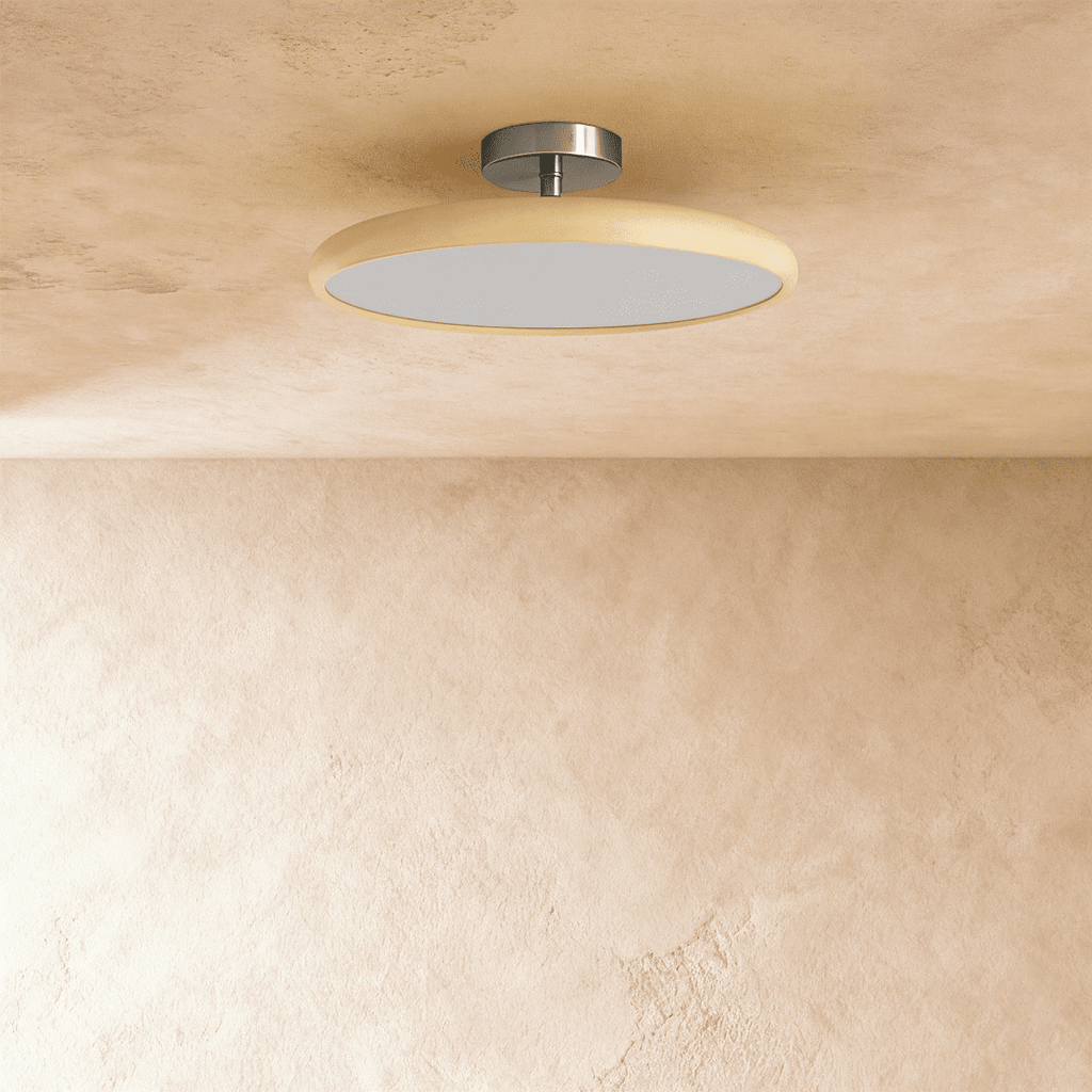 Clérachic cream-rimmed round ceiling light switched off, showing the flat white diffuser and brushed metal canopy.