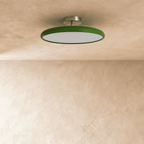 Clérachic glossy green round ceiling light switched off, with a flat white diffuser and a short brushed metal stem.