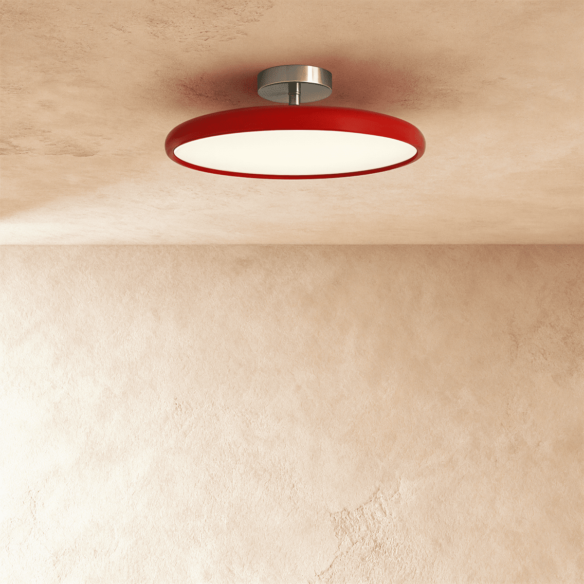 Clérachic slim round ceiling light with a glossy red rim and glowing white diffuser, on a brushed nickel stem.