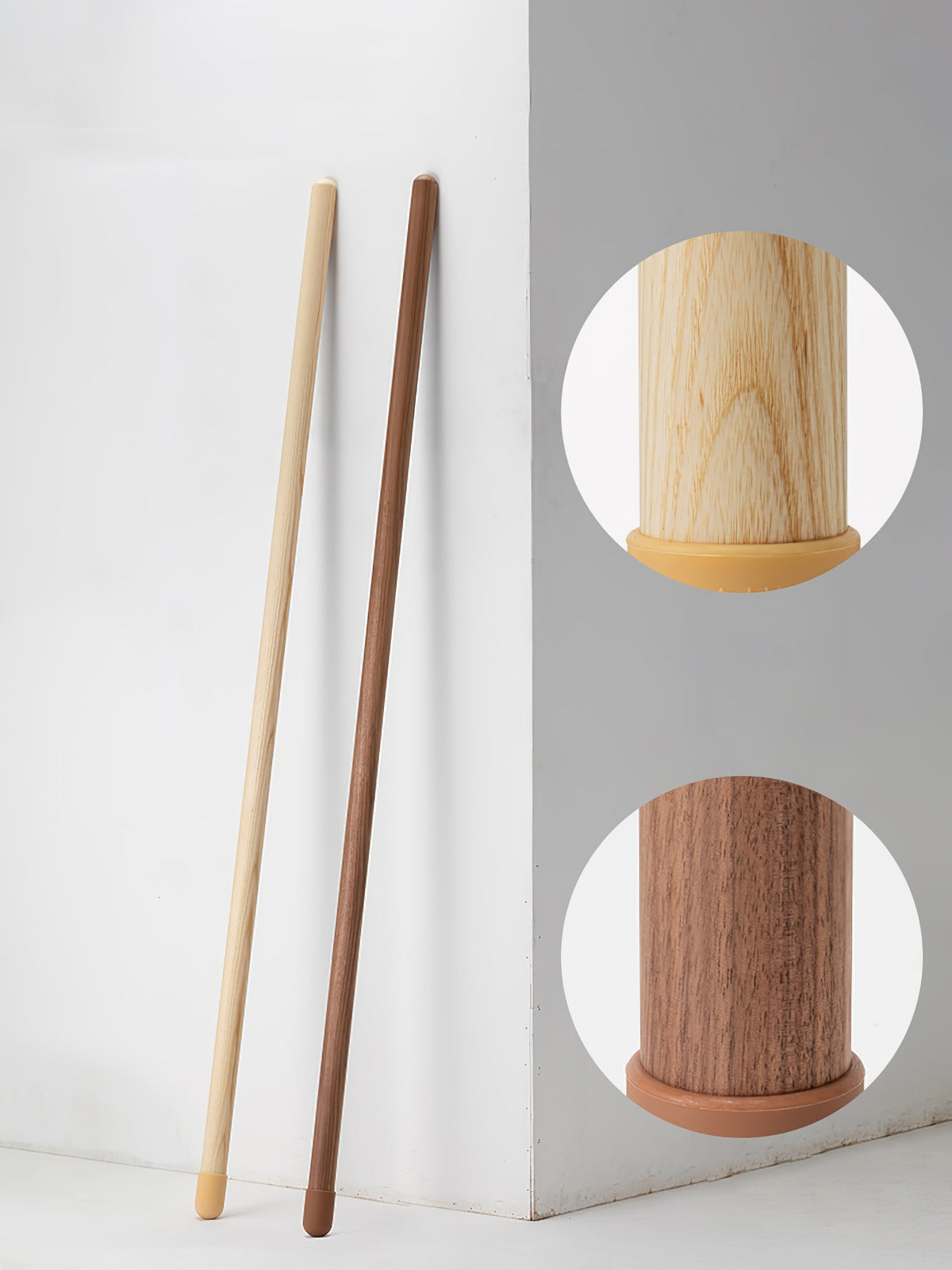 Light wood and walnut-colour Clérachic floor lamps leaning together on a white wall, with round insets of each foot.