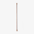 Walnut-colour Clérachic floor lamp standing upright with its frosted strip facing out, on a plain light backdrop.