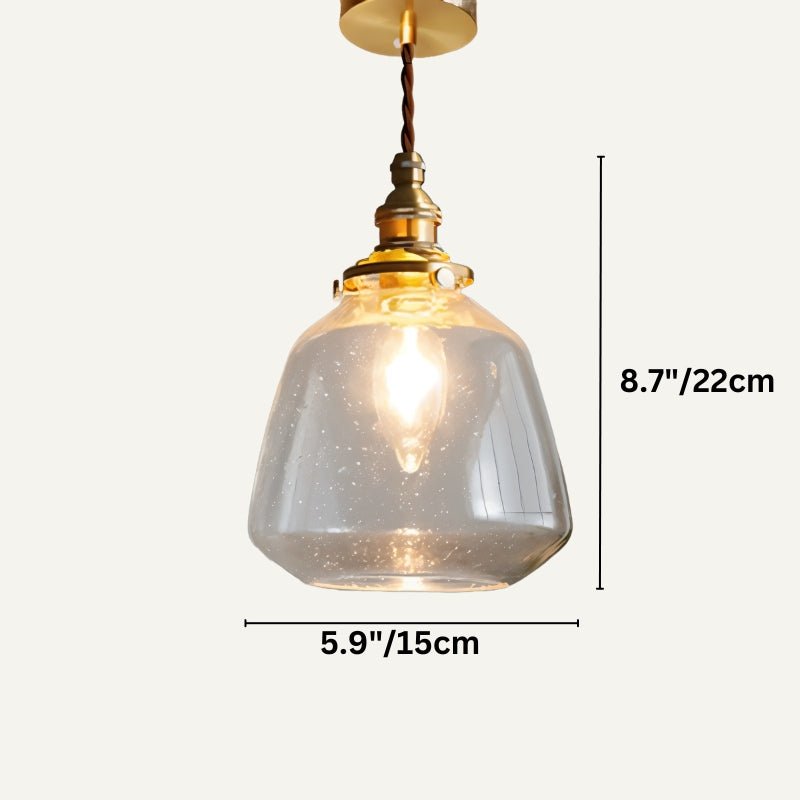 Clérachic clear bubbled glass pendant with a brass holder and candle-style bulb, 15 cm wide and 22 cm high.