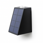 Clérachic black wedge-shaped solar wall lamp with a slanted solar panel face and a clear dome on top, on a white background.