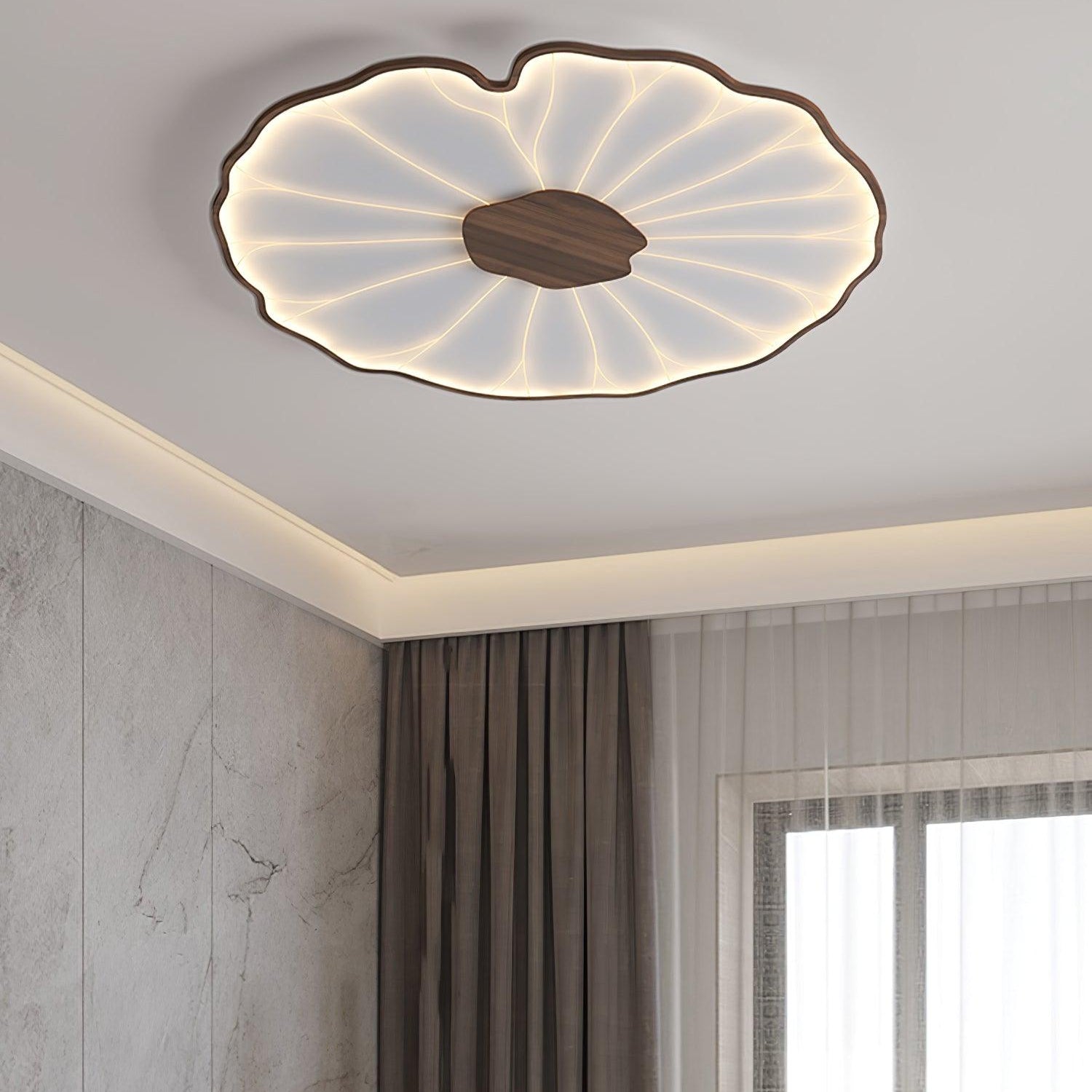 The Clérachic ceiling light in dark walnut finish glows warm in a room with a marble accent wall and curtains.