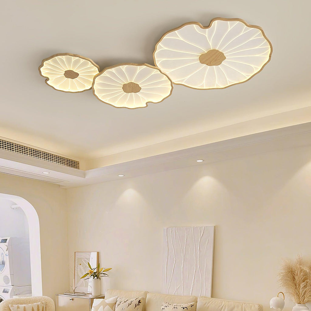 Clérachic three-shade ceiling light in light wood-grain finish above a cream room with an arched doorway.